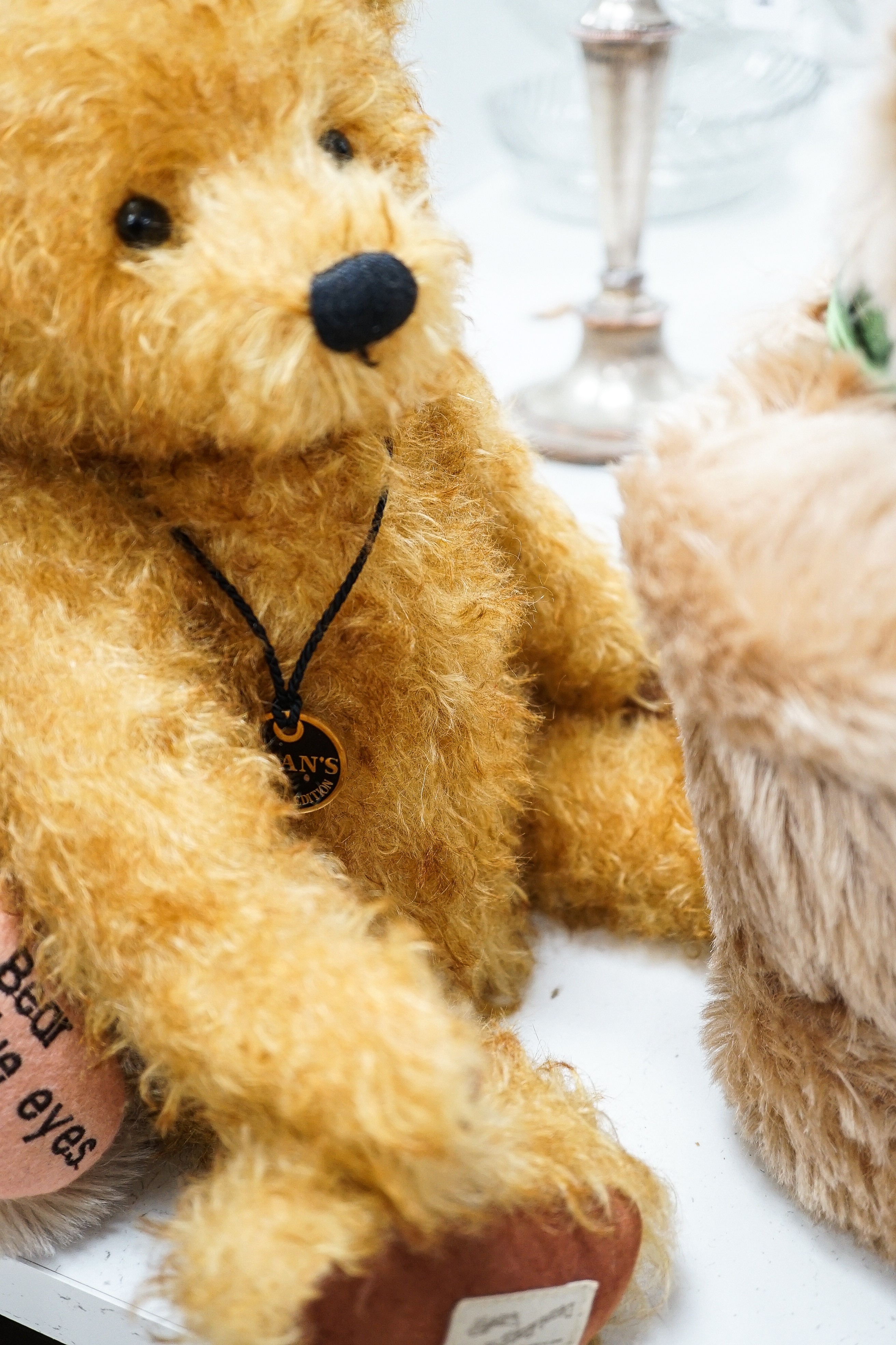 Four Deans teddy bears, a Steiff teddy and a Hermann teddy, Steiff bear, 39 cms high.